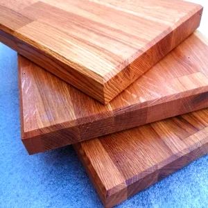 Range of handcrafted hardwood cutting boards showing different wood species